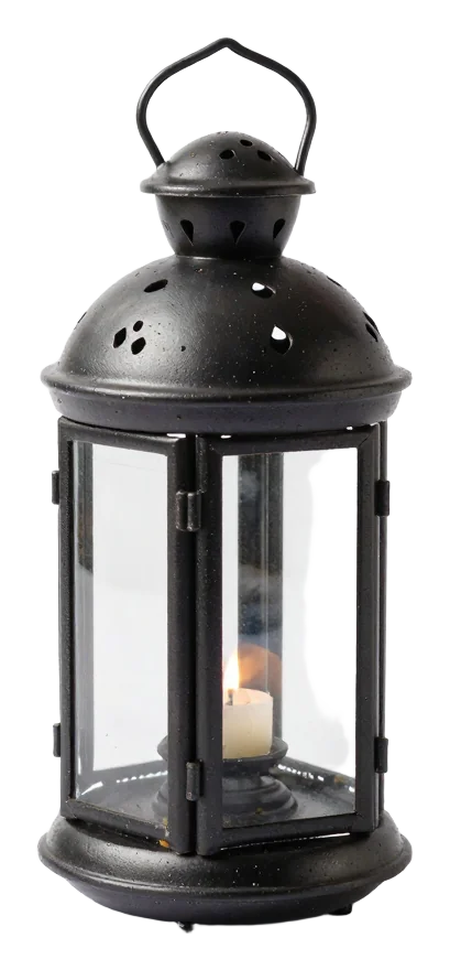 Black metal lantern with lit candle inside.