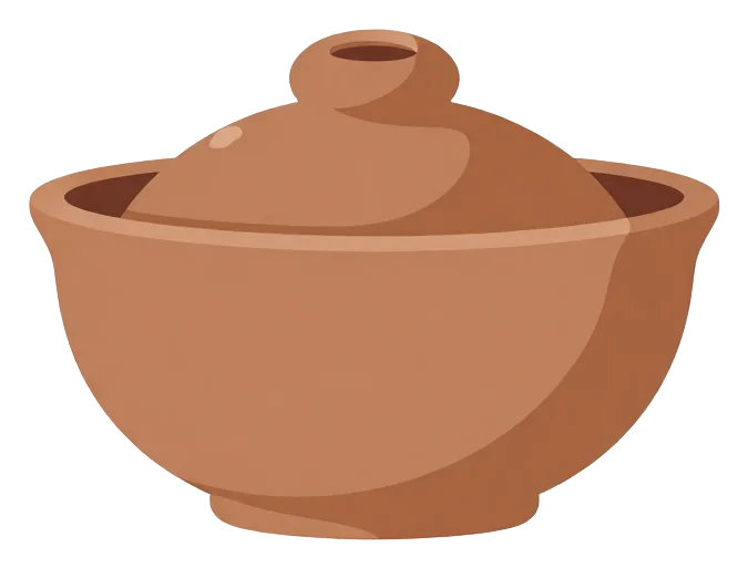 A clay diya with a lid for Diwali.